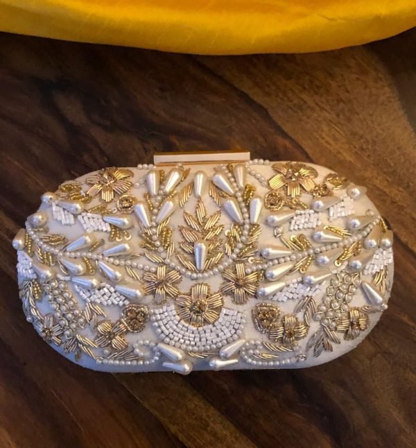 Zupppy Home Decor Oval shaped embroidery heavy work clutch