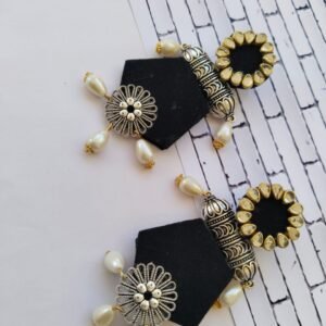 Zupppy Jewellery Rainvas Black long jhumka earrings with pearls for women