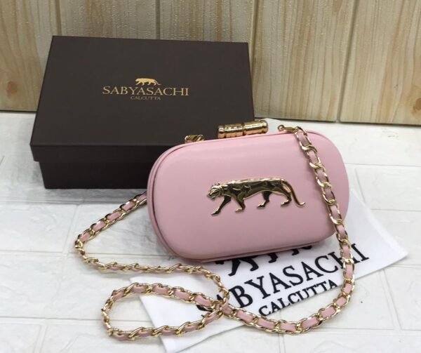Zupppy Accessories Sabyasachi Clutch Replica – PU & Synthetic Material, Branded Dust Cover, Inner Tag, With Box (10×7 Inches)