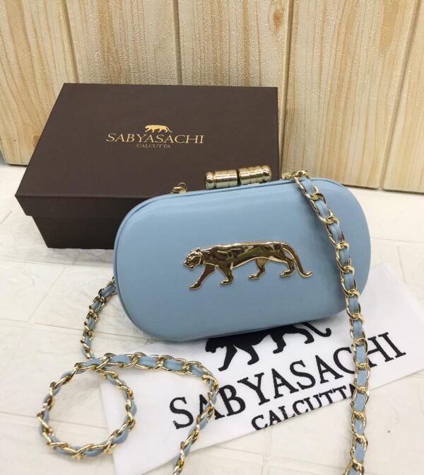 Zupppy Accessories Sabyasachi Clutch Replica – PU & Synthetic Material, Branded Dust Cover, Inner Tag, With Box (10×7 Inches)