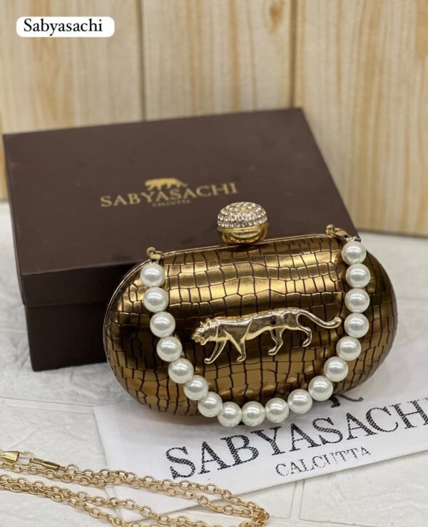 Zupppy Accessories Sabyasachi Clutch Replica – Synthetic Material, Branded Dust Cover, Box Packed