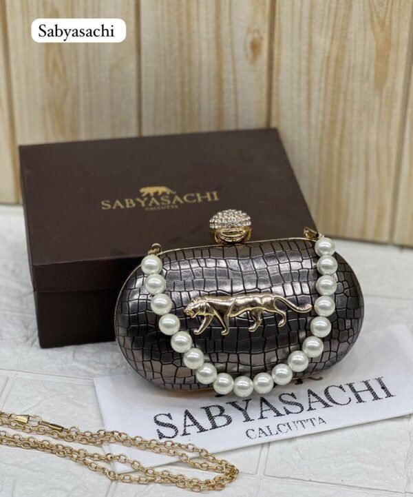 Zupppy Accessories Sabyasachi Clutch Replica – Synthetic Material, Branded Dust Cover, Box Packed