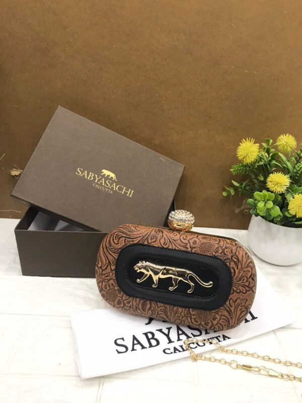 Zupppy Accessories Sabyasachi Clutch Replica – PU & Synthetic Material, Branded Dust Cover, With Box (10×7 Inches)