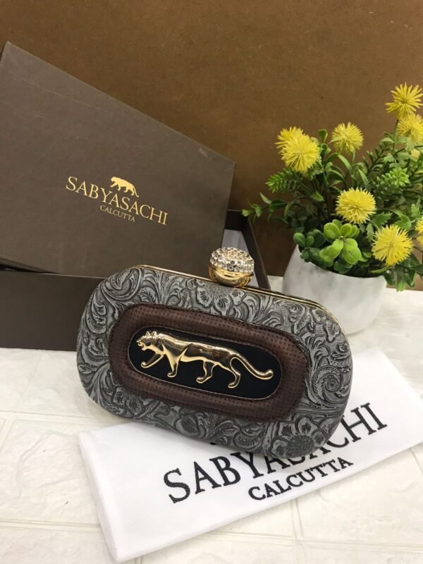 Zupppy Accessories Sabyasachi Clutch Replica – PU & Synthetic Material, Branded Dust Cover, With Box (10×7 Inches)