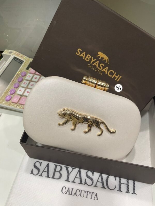 Zupppy Accessories Sabyasachi Clutch Replica – PU & Synthetic Material, Branded Dust Cover, Box Packed