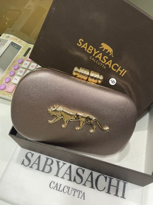 Zupppy Accessories Sabyasachi Clutch Replica – PU & Synthetic Material, Branded Dust Cover, Box Packed