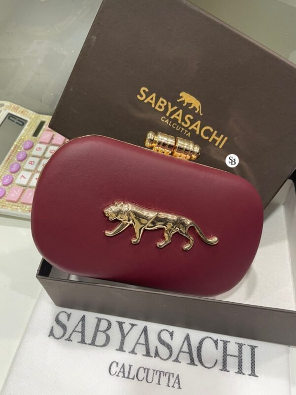 Zupppy Accessories Sabyasachi Clutch Replica – PU & Synthetic Material, Branded Dust Cover, Box Packed